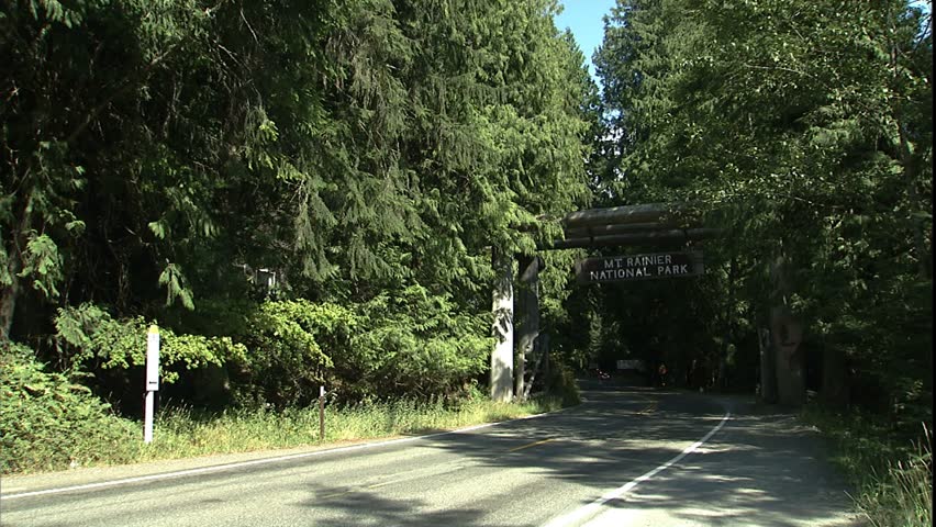 Mt. Rainier National Park entrance, to trees beyond sign