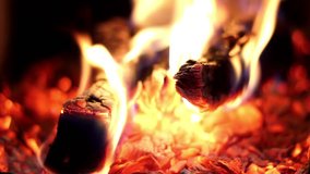 Burning Wood In The Fireplace, A looping clip of a fireplace with medium size flames. the dying embers in the fireplace. Full HD 60 sec. (1 minute) nice real fireplace, resolution 1920x1080. FHD.