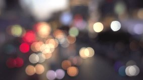 4K Bokeh of car lights. On the street at night Colorful Circles Video Background Loop Glassy circular shapes perform a colorful dance. motion background that events Car Lights - out of focus