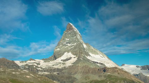 dawn, morning time lapse of the amazing matterhorn mountain in the Swiss Alps. the sky lights up in an incredible display of colour just after sunrise