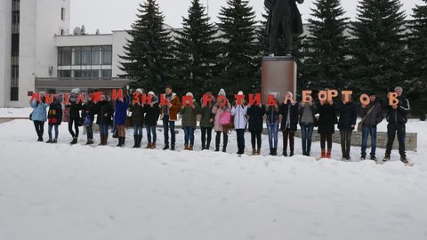Mtsensk, Russia 20 Dec 2016. EDITORIAL - a life without abortion volunteers marching on the Central square of Mtsensk, with the aim of preserving life ("we are for life against abortion"). 4K
