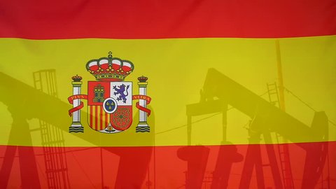 Concept oil production in Spain oil pumps and spanish flag in slow motion movement
