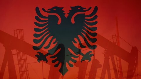 Concept oil production in Albania oil pumps and albanian flag in slow motion movement
