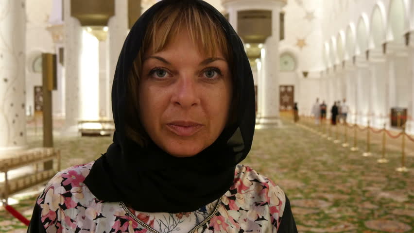 European woman in Abu Dhabi mosque. Closeup