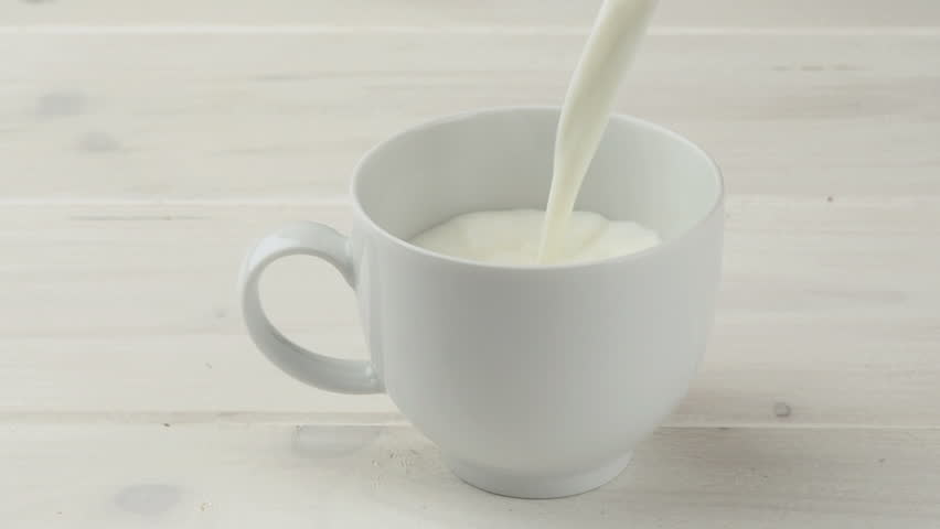 Pouring Cup Of Milk Closeup Stock Footage Video 100 Royalty Free Shutterstock