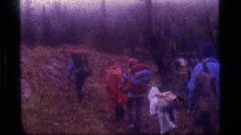 SAPPHIRE LAKE MONTANA 1977: people trekking on mountain