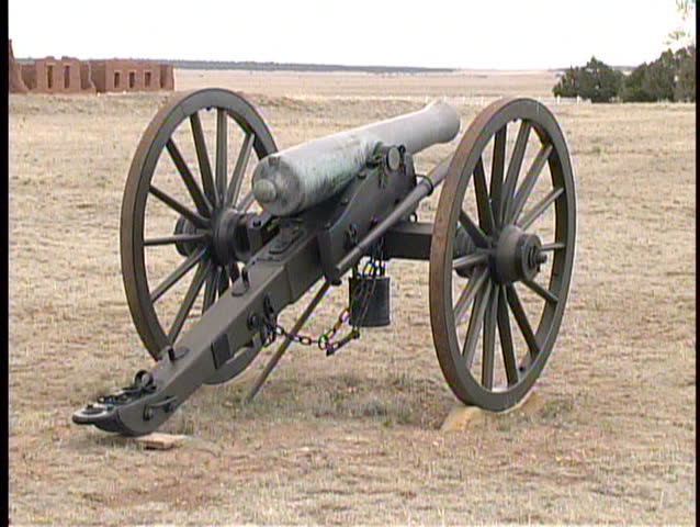 A zoom out from and back into the Civil War era cannon on the grounds of old Fort Union National Monument in New Mexico