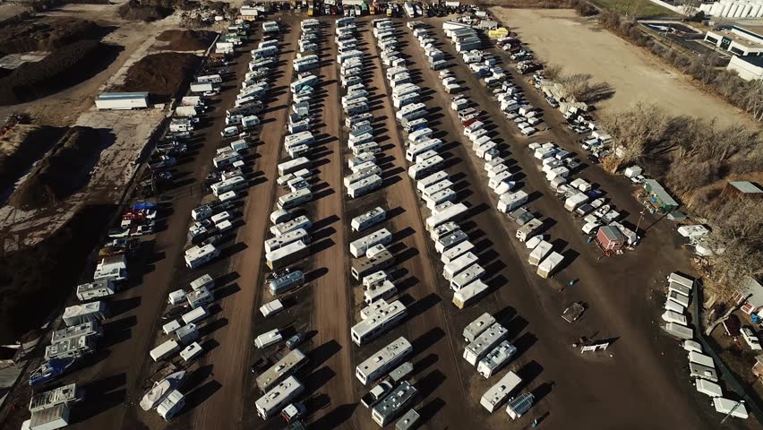 sky view of giant rv sales lot parked vehicles Royalty-Free Stock Footage #22604641