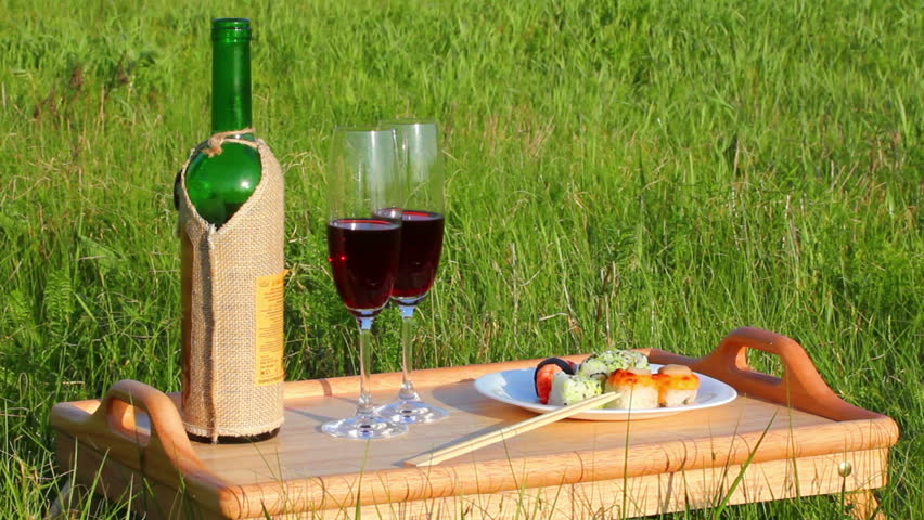 picnic - tabel with wine and japanese food
