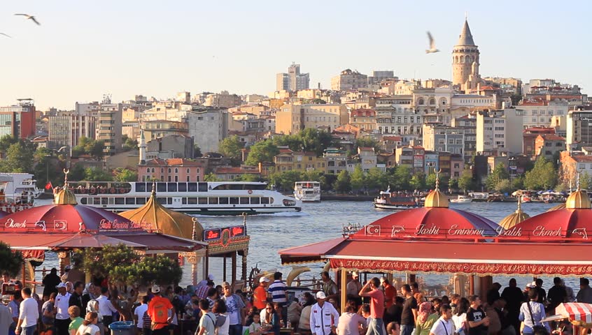 ISTANBUL - JUNE 21: Eminonu Pier looking to Goldenhorn and Galata Tower on June