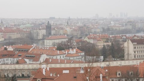Slow tilt on beautiful cityscape of Czech Republic by the day 3840X2160 UHD footage - Famous rooftops spires and domes in capital of Czechia 2160p UltraHD tilting video