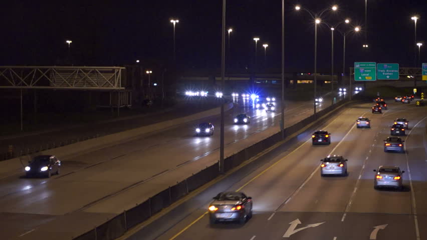 Highway traffic at night.