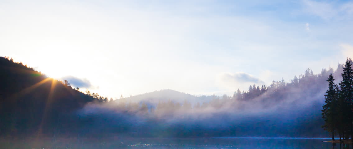 Dawn at lake in mountain, time lapse
