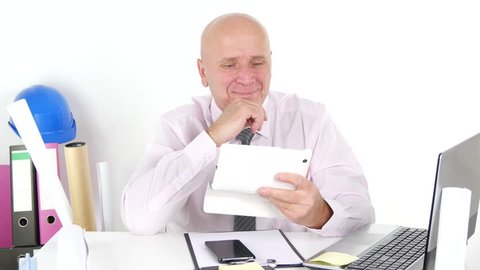 Businessman Smiling Use Tablet and Receive Financial Good News Reading Email.