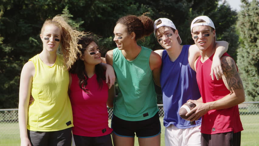 Portrait of young football players in the park