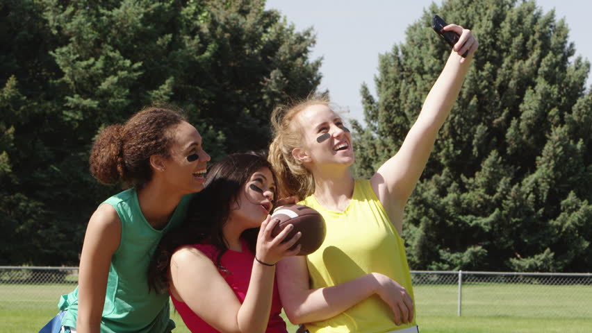Young football players taking a selfie