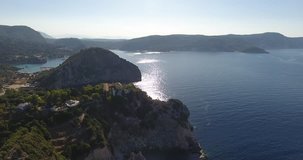 Corfu Paleokastrita bay with clear blue waters. Aerial footage from a drone. Kerkyra Island, Greece.