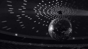 Disco-ball rotating at nightclub. Christmas (Xmas) or New Year holiday background. Real time full hd video footage.