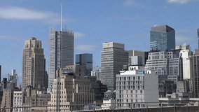 Establishing shot of New York City tall apartment skyscrapers in midtown Manhattan