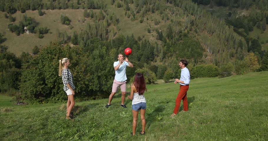 Beautiful Group of Young People Playing Volley Ball Mountain Trip Team Building | Shutterstock HD Video #22702846