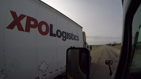 Semi-Truck Exterior Wide Angle Shot - A "XPO" Logistics Double Semi-Truck Passes on the left near York, Nebraska.
12/15/16