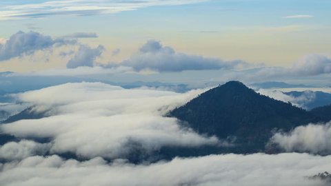 Beautiful View Of Fast Rolling Clouds Drifting Over Crocker Range. Soft Focus,Timelapse. Pahang, Malaysia. 4K UHD. Zoom In Camera Motion.