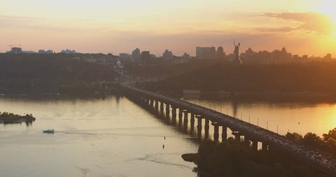 Busy traffic at the bridge. Kiev/Kyiv sunset