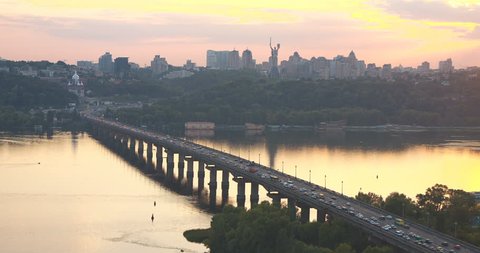 Busy traffic at the bridge. Kiev/Kyiv sunset