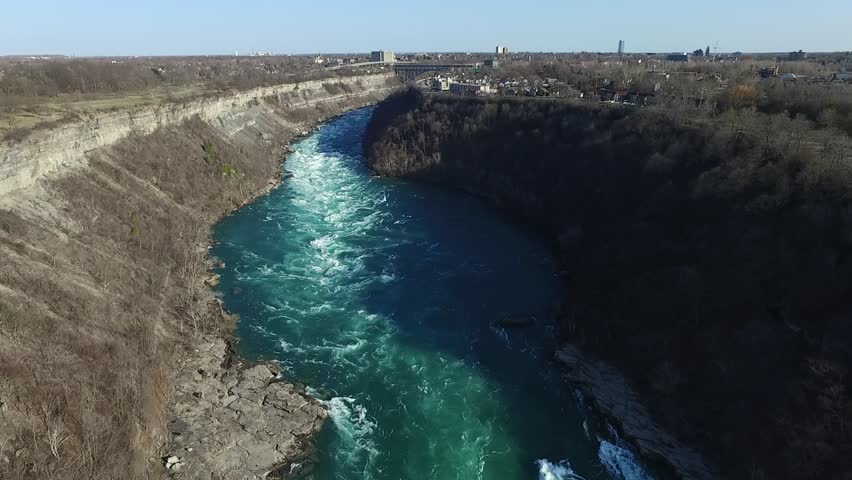 Niagara whirlpool camera moving backward over water aerial
