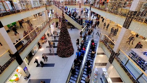 Krakow, Poland - December 22, 2016: People visit mall Galeria Krakowska at Christmas time
