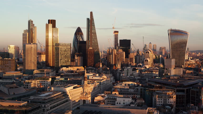 Establishing shot elevated view - day to night time-lapse of the business district of London
