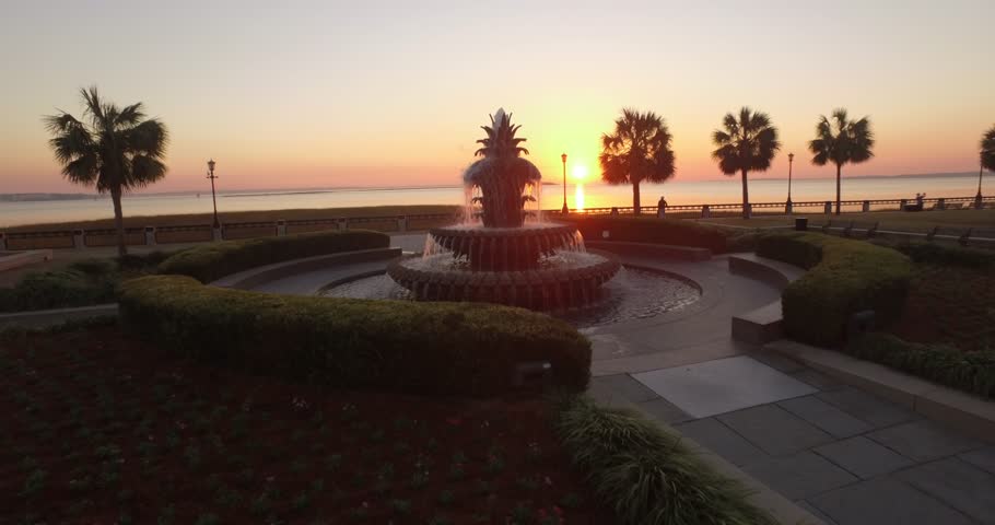 Aerial flyover of the Pineapple Fountain at sunrise in Charleston, SC