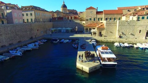 Dubrovnik: Aerial view of the city harbor in the old town of Dubrovnik in Croatia, Europe filmed by a drone 1/2