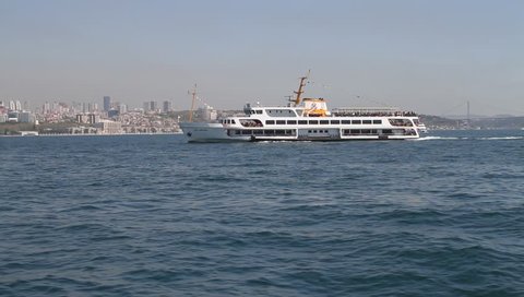 ISTANBUL - APRIL 23: Sehir Hatlari ferry goes from European side of Istanbul to Asia side on Bosphorus on April 23, 2011 in Istanbul, Turkey. Sehir hatlari manage ferries on Bosphorus line since 1851