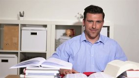 Happy smiling student holding oversized red jigsaw puzzle pieces behind books
 - Powered by Shutterstock - Get 15% off with code: PIKWIZARD15
