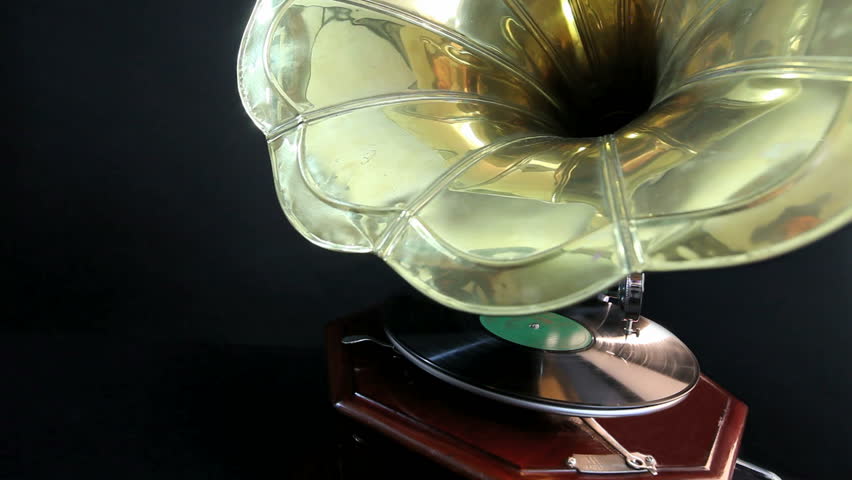 Close-up of a vintage Gramophone playing a record with black background