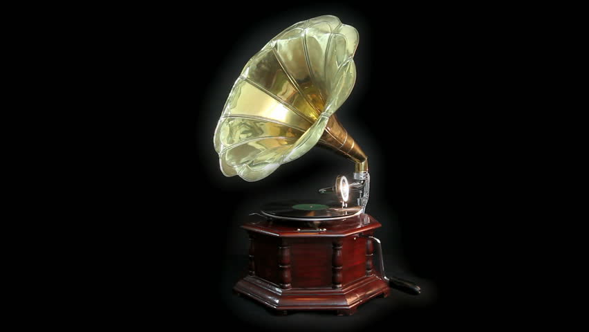 Vintage Gramophone playing a record with black background