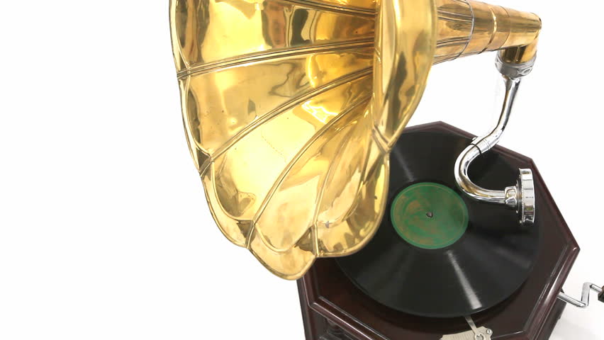 Vintage Gramophone playing a record with white background