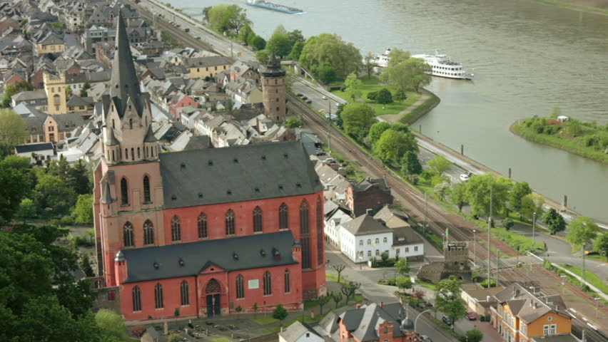village and big church at river rhine in germany
