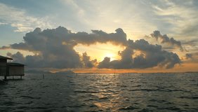Sunrise of a Sea Bajau hut, video taken on the boat