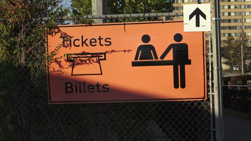 Bus tickets purchase signage in English and French, Ontario, Canada