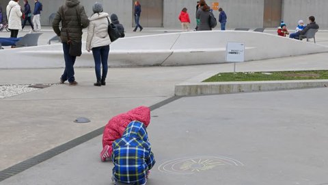 Children draw in front of MAXXI Rome, Italy - February 21, 2015: is a national museum of contemporary art and architecture.