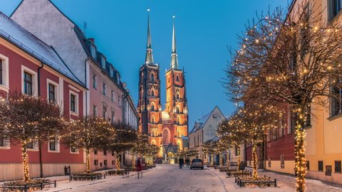 Winter in Wroclaw, Poland. Cathedral of St. John. Street with Christmas lights. Time lapse video