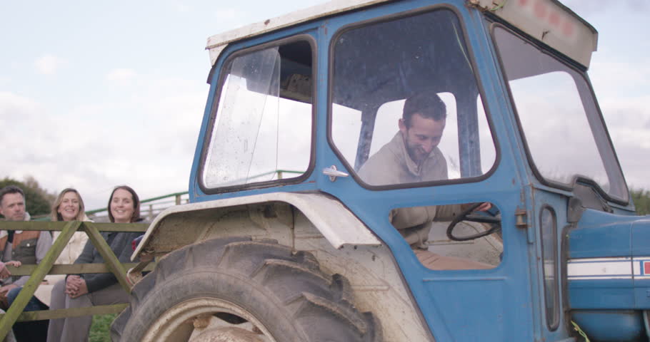 4K Visitors to a rural activity centre take their seats for a tractor ride Dec 2016-UK