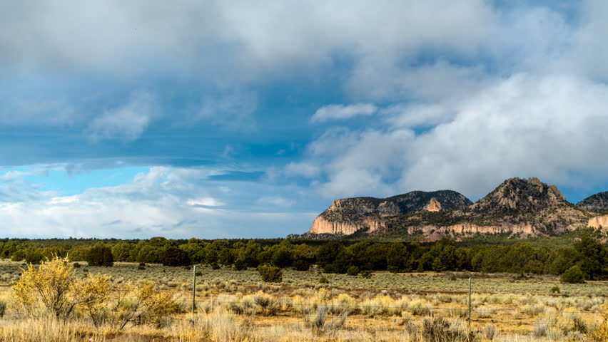 New Mexico Landscape. Storm clouds move quickly over the tops of Capital Dome Mountain in New Mexico