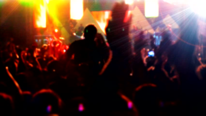 silhouettes concert dancing jumping waving,Stage and audience,girl at a concert seating on shoulders raising her hands,Lot of people clapping at rave party,summer festival people crowd partying night Royalty-Free Stock Footage #2280662