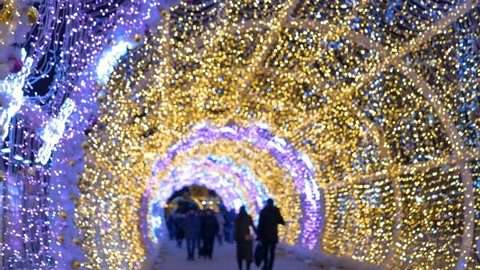 The tunnel of glowing lights. Decorating for Christmas