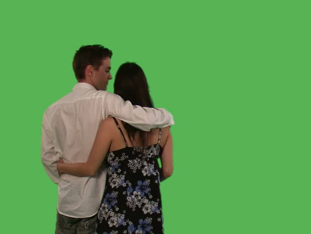 happy couple over green screen
