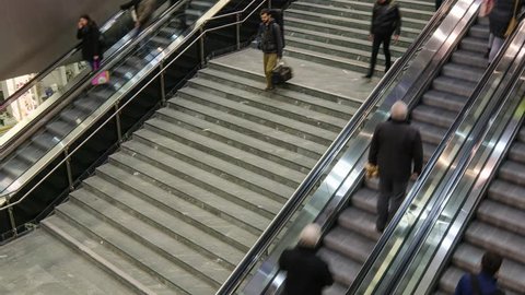 People at escalator and stair fast moving up and down timelapse