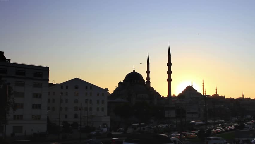Istanbul silhouette with mosques at sunset.
